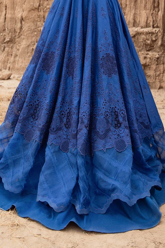 Blue lace dress with a textured background