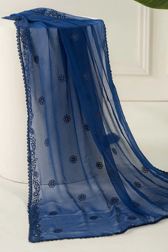 Blue embroidered fabric on a white background