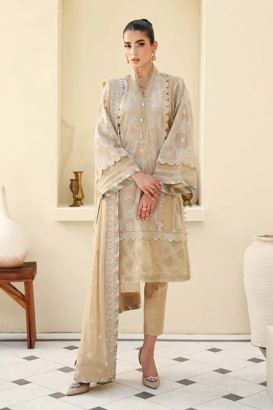 Woman in a traditional outfit standing in a room with white walls and a tiled floor.
